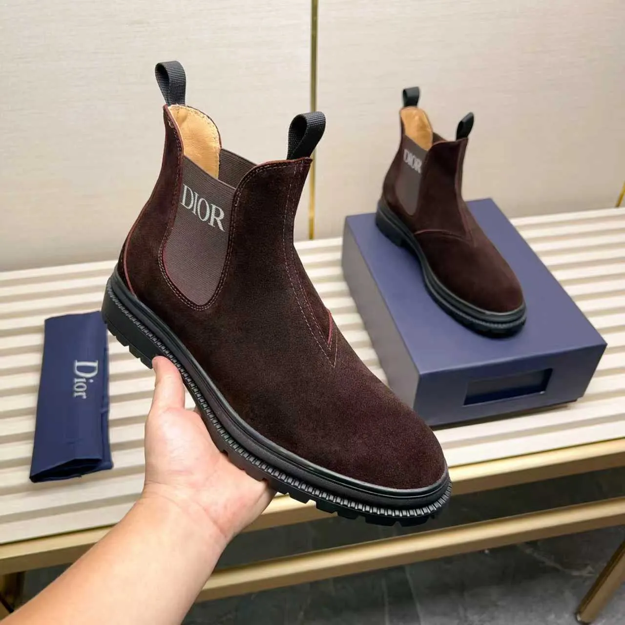 Men's Shoes 💰480 Dior A practical choice that combines protection with classic style. Made from durable Rugged Calf leather, it's tumbled and hand-finished to create a soft suede feel with a rich texture. Elastic side panels and subtle cutouts are inspired by the classic Chelsea boot. Leather upper and lining with Kummel tabs at front and rear, rubber outsole